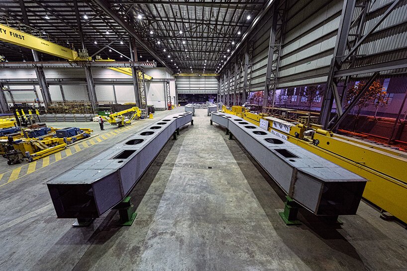 the ocean cleanup prepares production of floating garbage trucks to clean polluted rivers