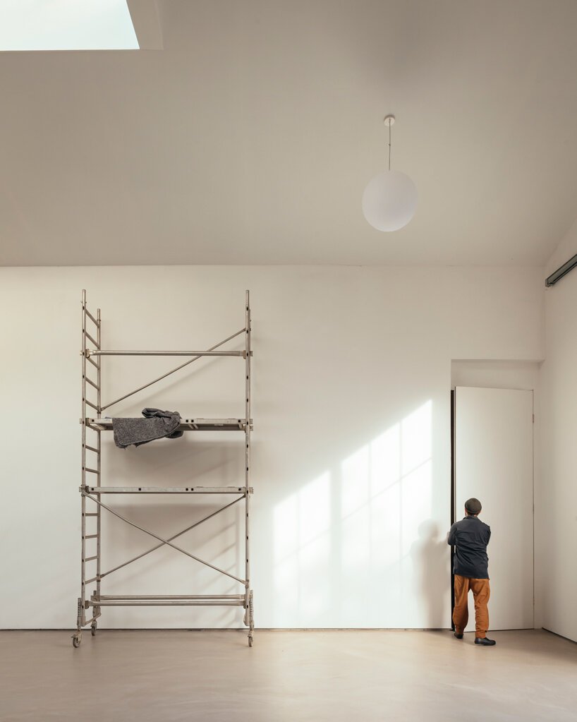 thomas randall-page turns an agricultural barn into a studio for his sculptor father in rural devon