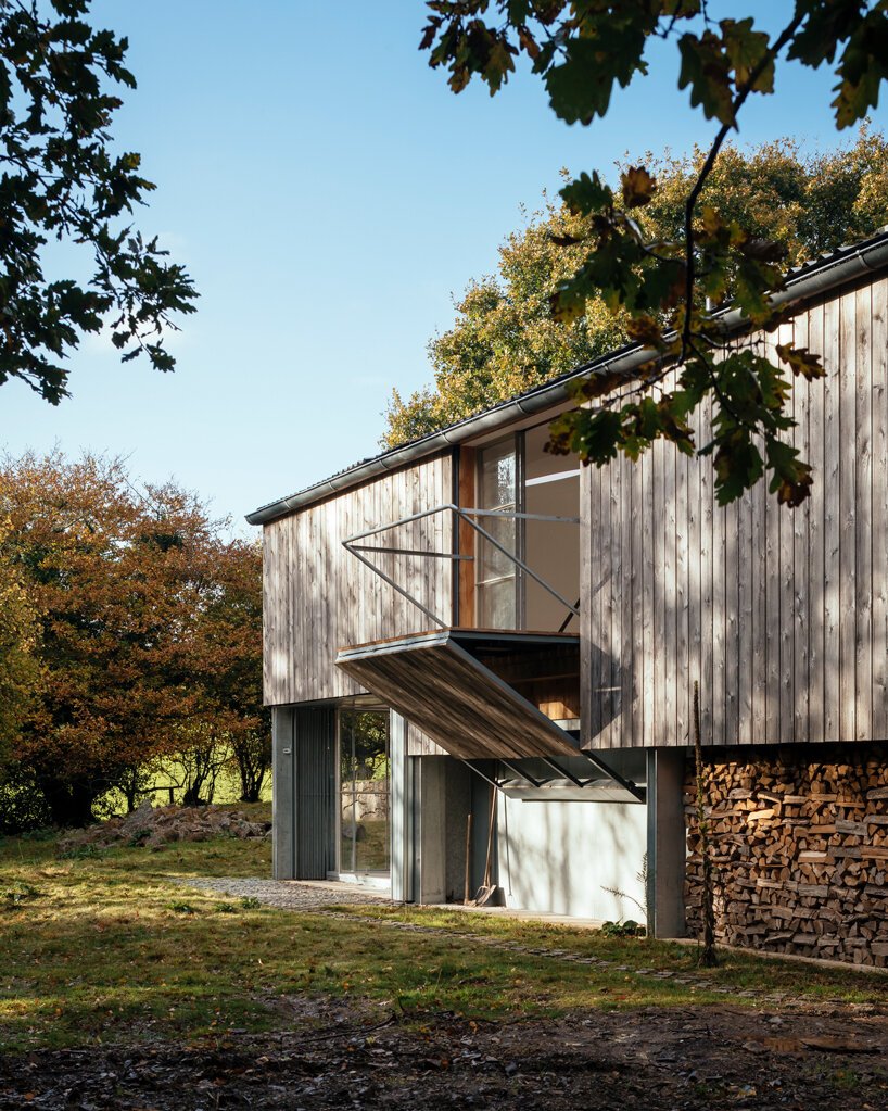 thomas randall-page turns an agricultural barn into a studio for his sculptor father in rural devon
