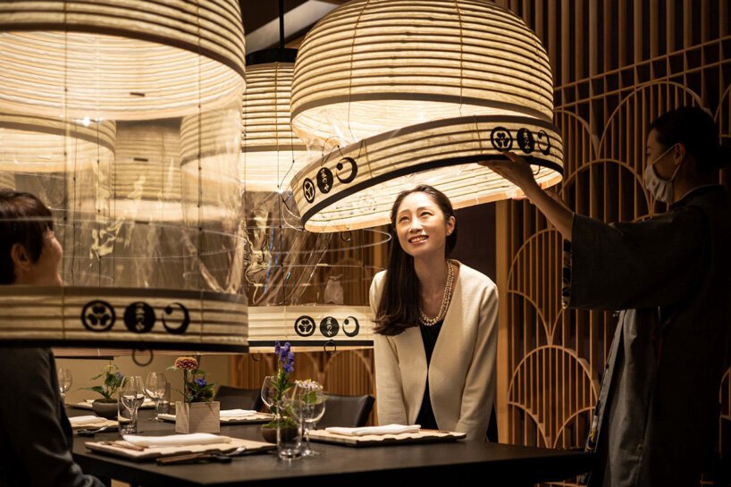 enjoy a facemask-free dinner under transparent lanterns in tokyo