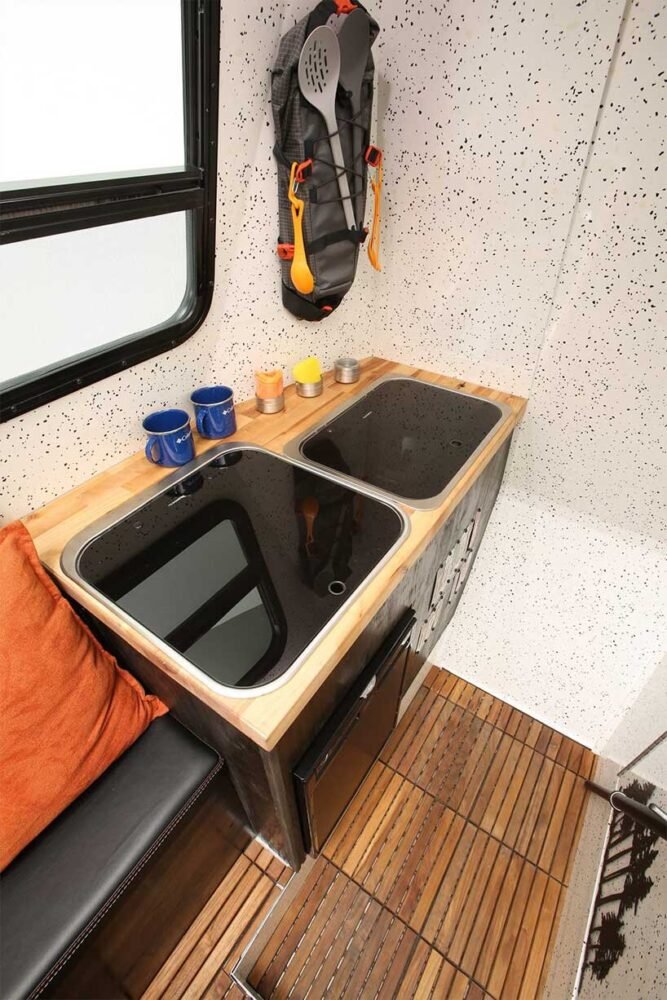 a fuel tank filler that completely separated from the camper ensures fuel fumes remain isolated