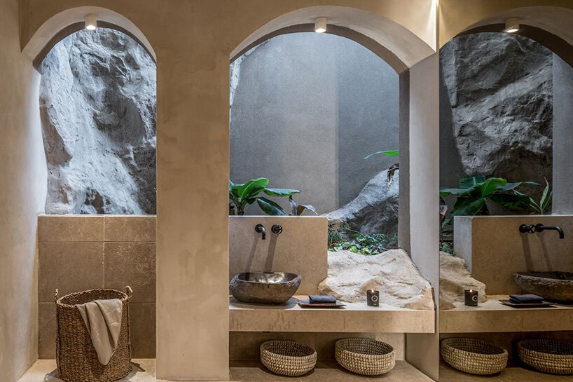 健康酒店“acro suites”占据了克里特岛沿海悬崖上的洞穴