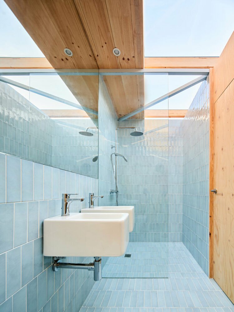 ágora arquitectura stacks cross laminated timber house atop old brick base in spain
