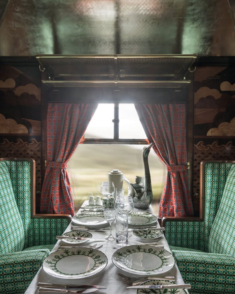 wes anderson revives 1950s train carriage inviting visitors into whimsical film sets
