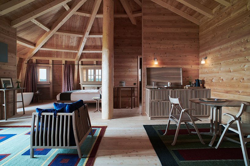 AMDL CIRCLE + michele de lucchi 使用回收的木材建造南蒂罗尔的酒店建筑