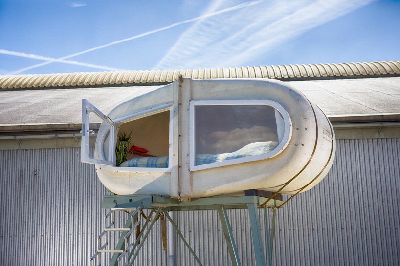 鹿特丹的文化露营地让您睡在由升级材料制成的奇特小屋中